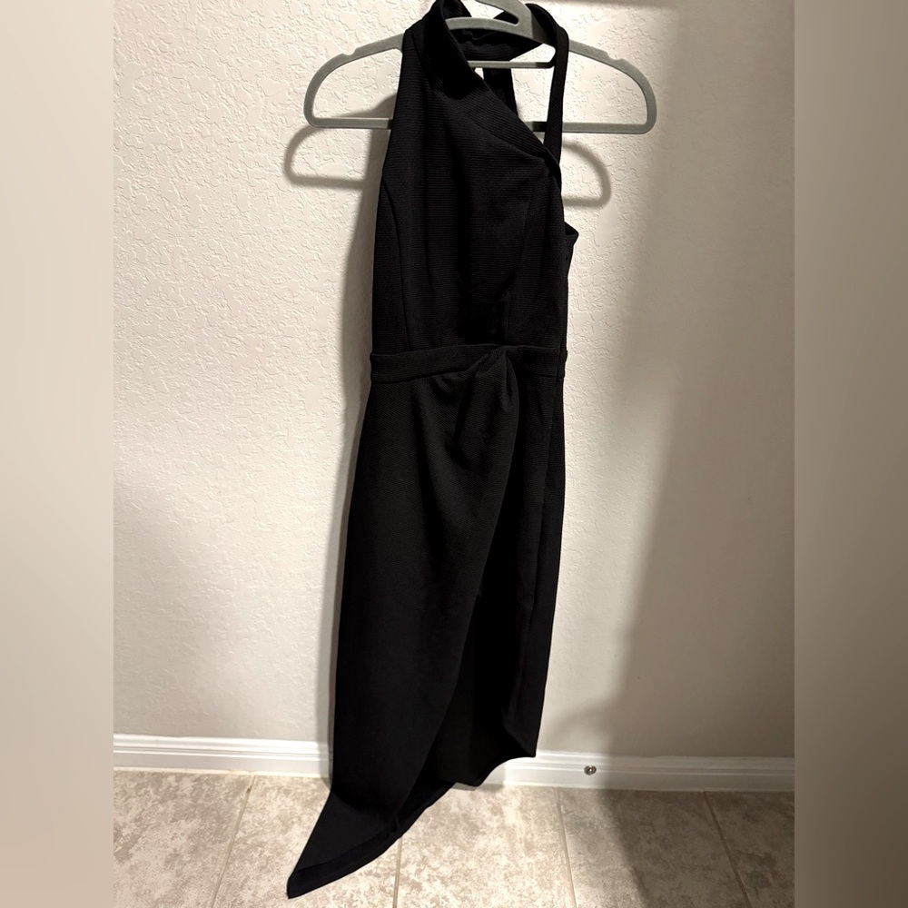 Little black dress,NEVER WORN but took the tags off.